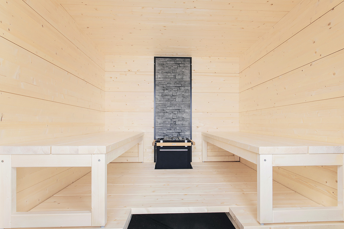 Sauna traditionnel massif intérieur extérieur design